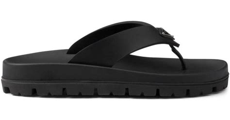 Soft Cage vinyl thong sandals in black 